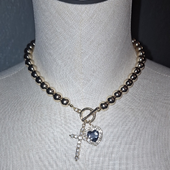 Elegant Gold Necklace with Jeweled Heart And Cross Pendant - Picture 1 of 4